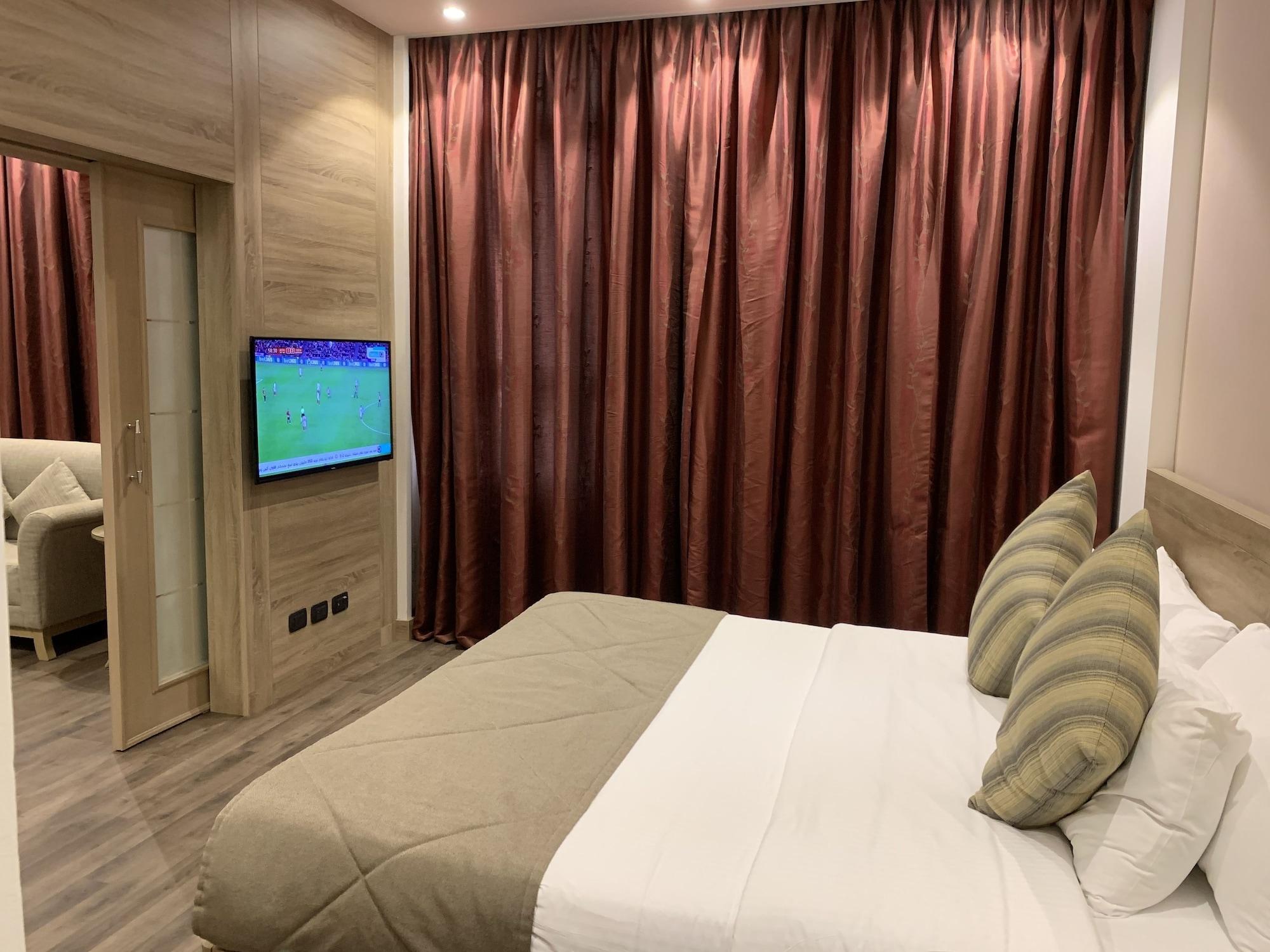 カールトン アル モアイベッド ホテル ダンマーム エクステリア 写真 A bedroom in the hotel