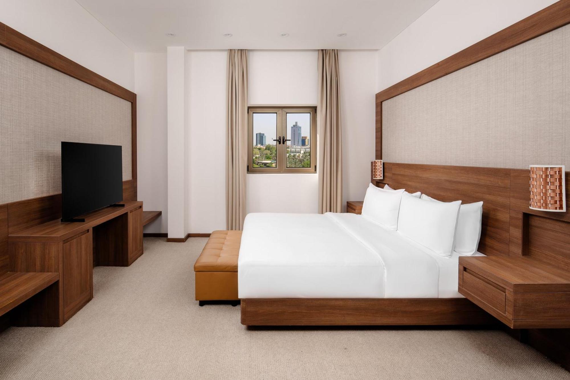 カールトン アル モアイベッド ホテル ダンマーム エクステリア 写真 A bedroom at the hotel